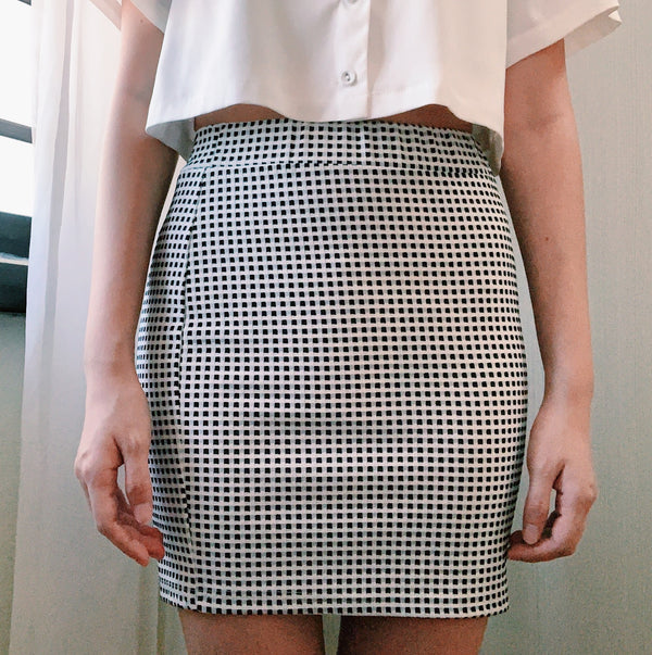 NET's checkered skirt